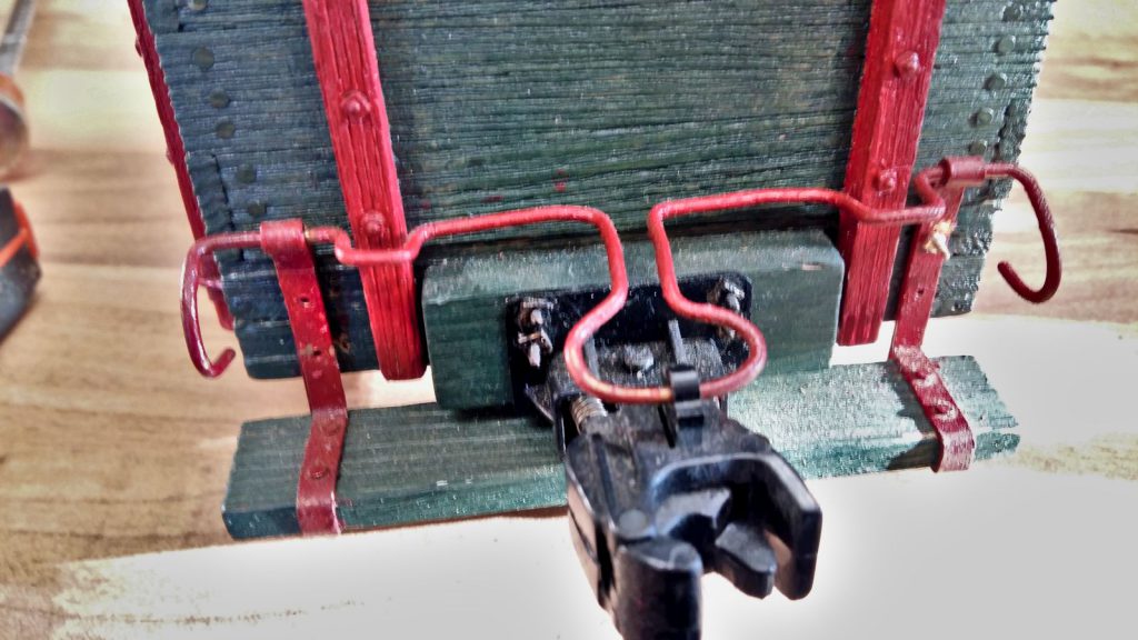 Fastening the conductor's platform with threaded rods.