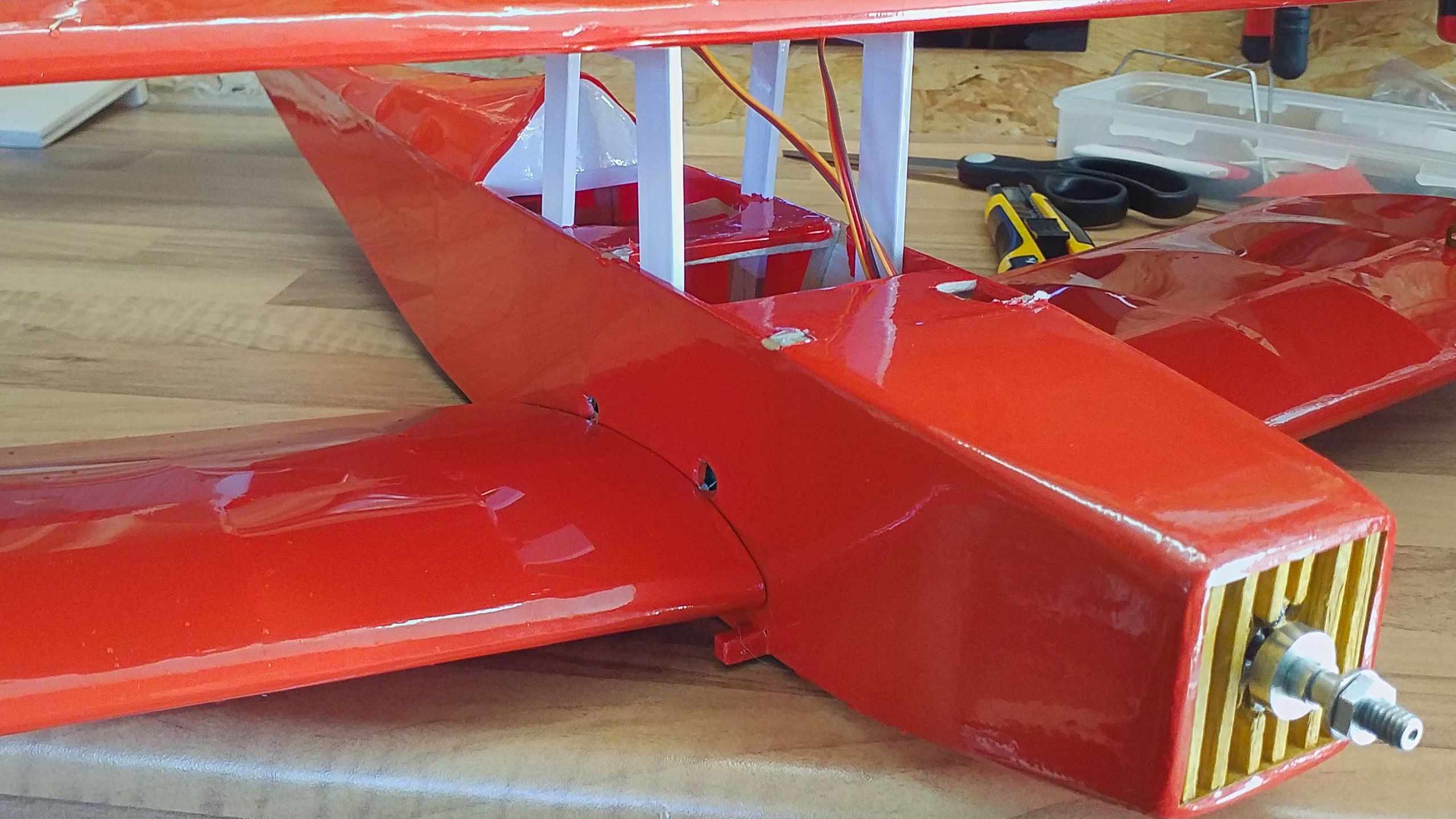 The new wing mounting made from plywood is seated farther to the rear.