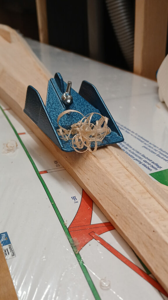 Why use sanding paper? A small plane is faster and less dusty.