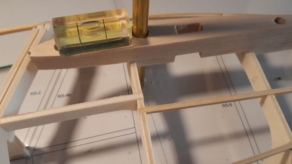 The finished wing root is aligned and glued in place with the help of the wing joiner.